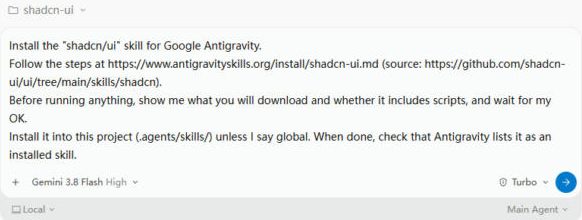 Antigravity 2.0 chat box with the shadcn/ui install message pasted in